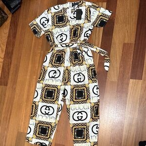 Gucci Black and Gold Patterned Jumpsuit